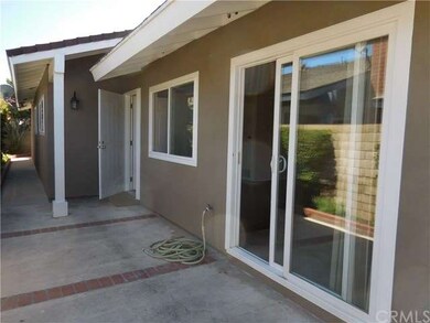 Sliding patio door from dining area and kitchen is