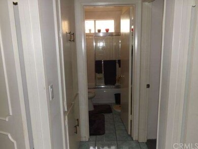 Hallway leading to bath and bedrooms