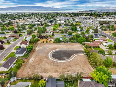 Aerial perspective of suburban area with a mountainous background
