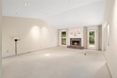 Living Room w/ Wood Burning Fireplace