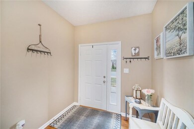 Entry with hardwood floors