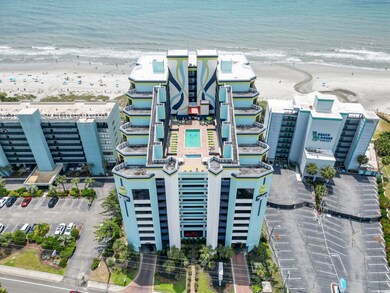 Drone / aerial view featuring a water view and a v