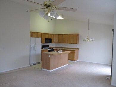 living area to kitchen