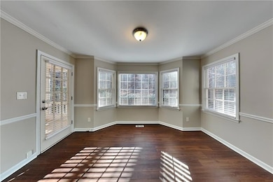 Unfurnished dining area with wood finished floors,
