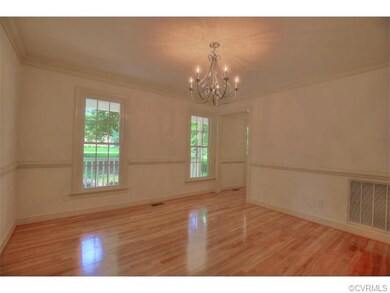 Dining Room with refinished hardwood floors.