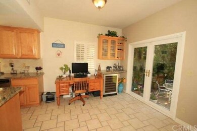 Breakfast area, with French doors leading to backy