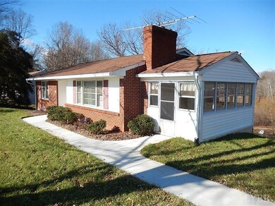 Right side of home showing sunroom