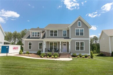 Beautiful curb appeal and located on a private lot with woods behind. Nothing will be built behind house.