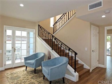 Sitting area with view to the side patio.  Hallway