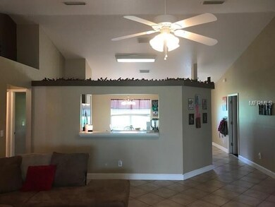 View from Den/office into opening of kitchen