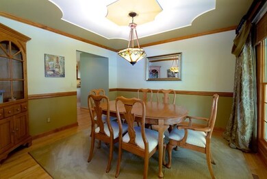 adorned with Crown Moulding & Chair Rail along wit