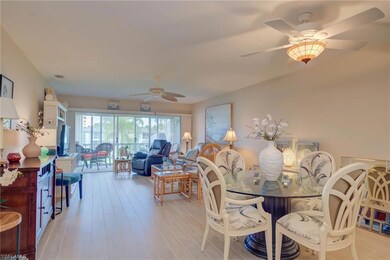 Dining room with ceiling fan and light wood-type flooring