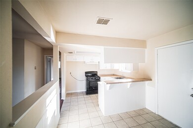 1327 Diplomat Way, Houston, TX 77088 - photo 6