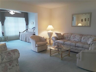 Living room where extension may be used as a home 