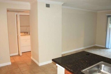 MORE PARTIAL VIEWS OF THE HALLWAY, AND LIVING ROOM