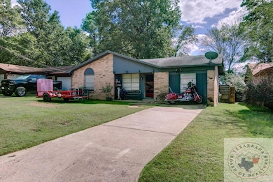 211 Hickerson Ave, Wake Village, TX 75501 - photo 2