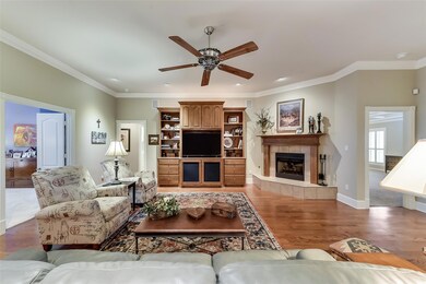 Oversized living area with built-in and Fireplace