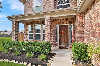 Beautiful and inviting front porch welcomes you home.