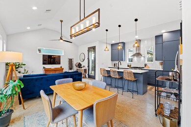 Dining area with visible vents, concrete floors, 