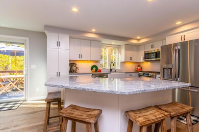 New kitchen with slider to deck