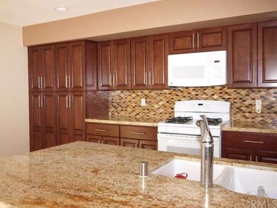 New recessed lighting.  New Mayfield Maple wood ca