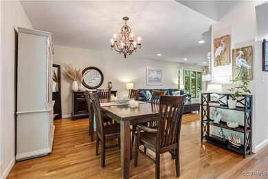 Dining space with light hardwood / wood-style floo