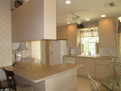 Neutral kitchen with Corian counter tops