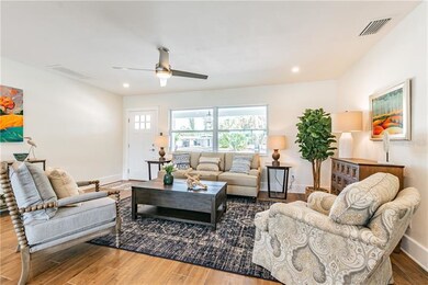 Living Room with upgraded wood like tile flooring,