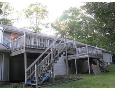 Exterior Back. Both units have rear decks overlook