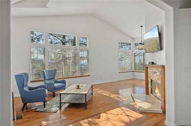 Living room with vaulted ceilings.