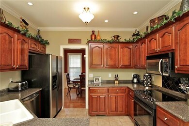 Open kitchen is very functional.