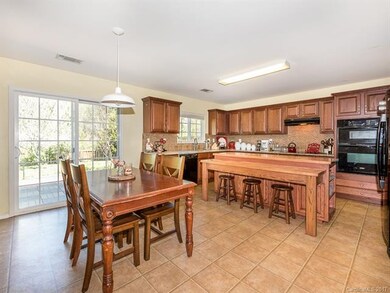Dining area with view of kitchen