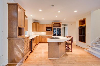 Full view of kitchen from the family room.  The seller is giving $5,000.00 towards kitchen upgrades on appliances to the qualified buyer at closing.
