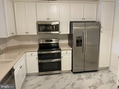 7871 Rolling Woods Ct unit 403, Springfield, VA 22152 - photo 3