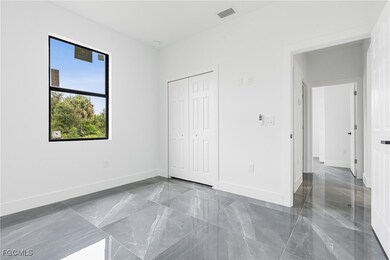 1107 W 18th St, Lehigh Acres, FL 33972 - photo 6