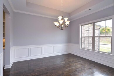 Dining Room  Photo is an Augusta II in a different Community. For representation only.