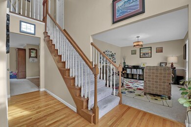 Main entry showing listening/formal dining room an