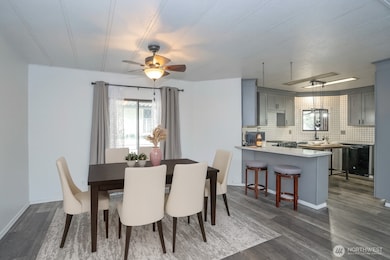Warm and inviting dining room - Virtually staged to inspire your vision of the space.