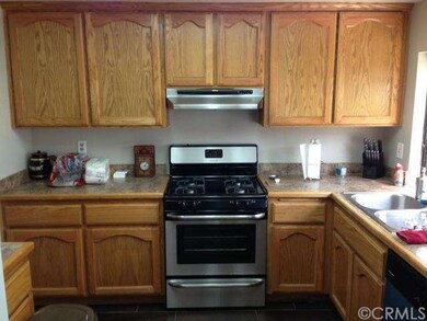 Kitchen area.  New stove.