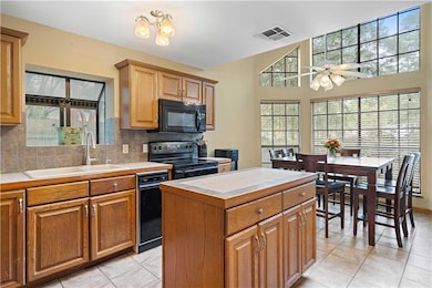 Floor to ceiling windows add to the spaciousness t