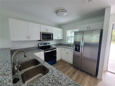 6950 San Benito Dr, Sebring, FL 33872 - photo 4