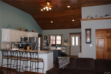 Dining room as a full wet bar and a wood burning s