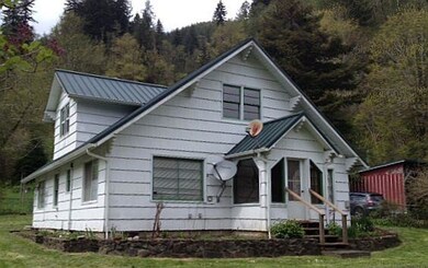 FRONT OF HOME & SOUTH SIDE VIEW