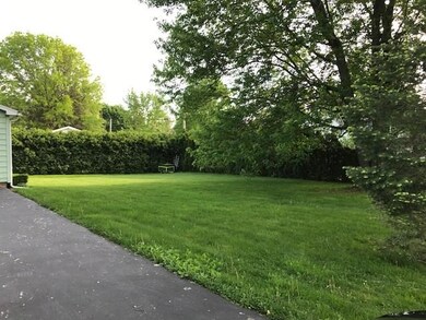 Beautiful side yard and private to neighbors. Hard