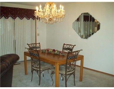 Dining Room. Large dining room is open to living room.  Spacious and light.