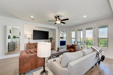 Inside, an open, sun-filled floor plan includes 3 bedrooms, 2.5 baths, a dedicated office, and a bonus second-floor living area. (photo virtually staged)