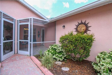 Property entrance with a patio area