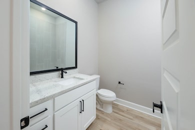 Each bathroom has expansive vanities offering an a