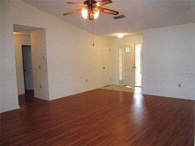 large open living room to foyer with coat closet