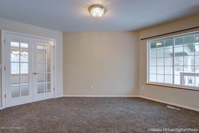 Formal Living Room With French Doors